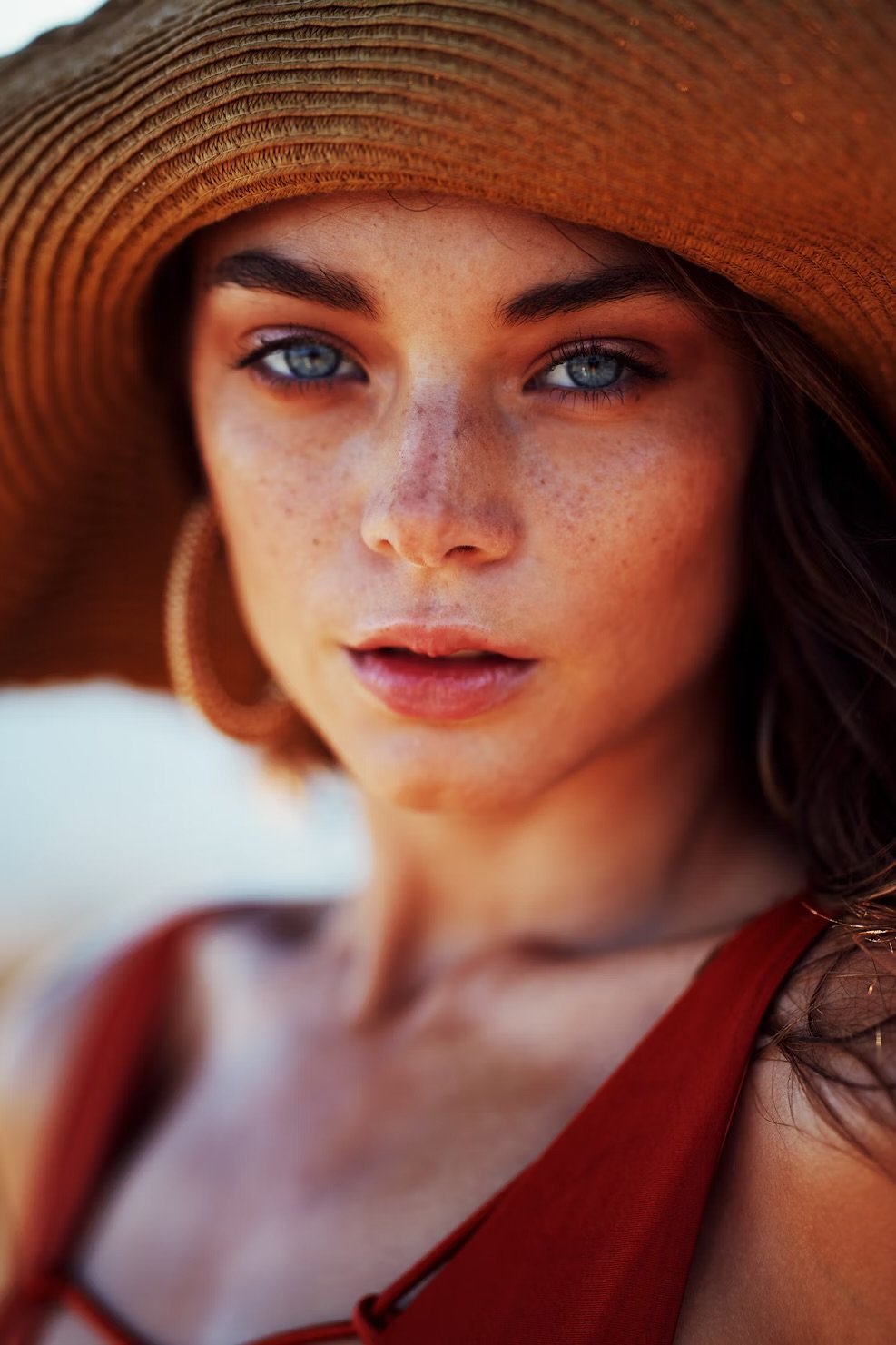 Woman in summer with slightly burned skin